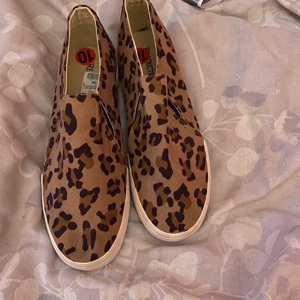 Leopard print slip on shoes never worn